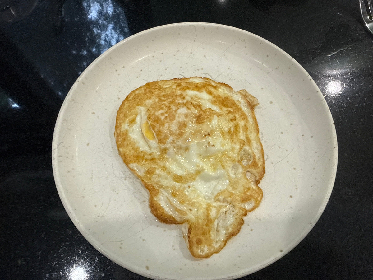 How to Fry an Egg on Carbon Steel Without It Sticking