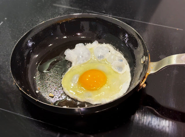 How to Fry an Egg on Carbon Steel Without It Sticking